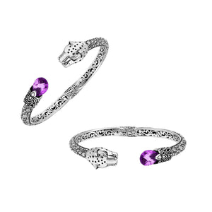 Sterling silver panther head cuff bangle with amethyst quartz ends and floral carvings handcrafted in Bali.