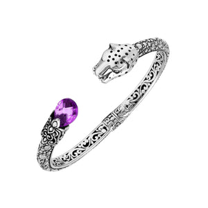 Sterling silver panther head cuff bangle with amethyst quartz ends and floral carvings handcrafted in Bali.