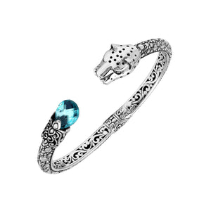 Sterling silver panther head cuff bangle with blue topaz quartz ends and floral carving handcrafted in Bali.
