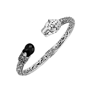 Sterling silver panther head cuff bangle with black onyx ends and floral detailing handcrafted in Bali.
