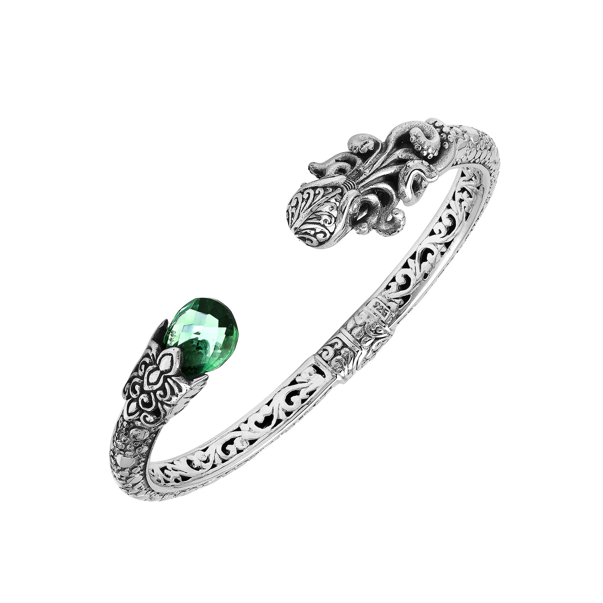 A wholesale sterling silver octopus-themed bangle featuring a bright green quartz stone, ornate Balinese tentacle carvings, oxidized textures, and a secure hinge lock for bulk jewelry orders.