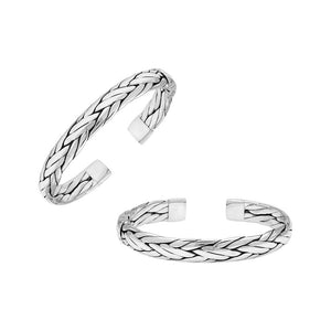 A wholesale sterling silver large woven bangle featuring bold Balinese textures, polished detailing, and a secure hinge lock, ideal for premium bulk jewelry purchasing.