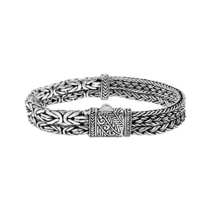 A wholesale sterling silver bracelet featuring a slim woven Balinese texture, polished finishing, smooth pattern, and secure push clasp suitable for premium bulk jewelry orders.