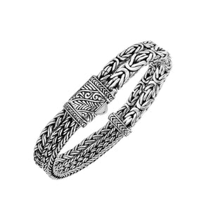 A wholesale sterling silver bracelet featuring a slim woven Balinese texture, polished finishing, smooth pattern, and secure push clasp suitable for premium bulk jewelry orders.