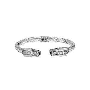 Wholesale sterling silver dragon head cuff bangle featuring detailed carvings, textured patterning, and a secure hinge-lock mechanism designed for reliable and consistent bulk inventory.