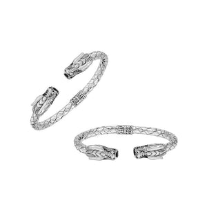 Wholesale sterling silver dragon head cuff bangle featuring detailed carvings, textured patterning, and a secure hinge-lock mechanism designed for reliable and consistent bulk inventory.