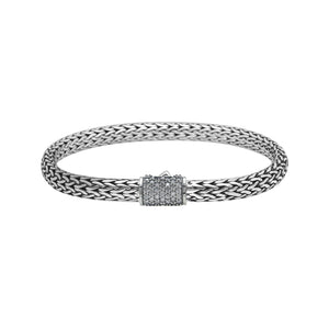 A wholesale sterling silver slim woven bracelet featuring a CVD Diamond-studded push clasp with polished and oxidized detailing, crafted for premium bulk jewelry collections demanding refined shine and durability.