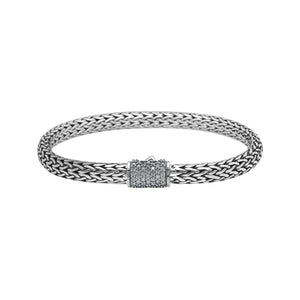 A wholesale sterling silver slim woven bracelet featuring a CVD Diamond-studded push clasp with polished and oxidized detailing, crafted for premium bulk jewelry collections demanding refined shine and durability.