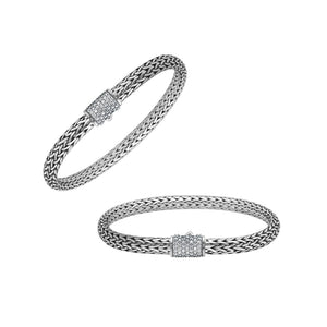 A wholesale sterling silver slim woven bracelet featuring a CVD Diamond-studded push clasp with polished and oxidized detailing, crafted for premium bulk jewelry collections demanding refined shine and durability.