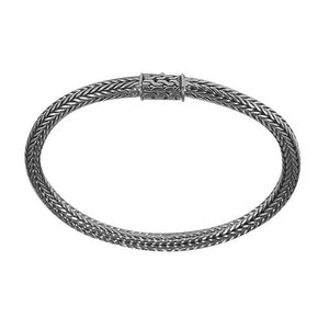 Sterling silver woven bracelet with polished surface and secure push clasp, featuring a classic rounded chain pattern for wholesale supply.