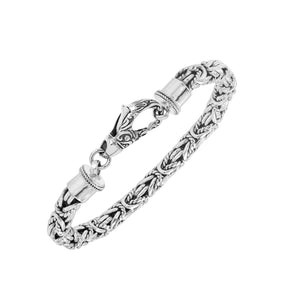 Wholesale sterling silver bracelet with Balinese woven wheat-link design and decorative lobster clasp handcrafted in Bali.