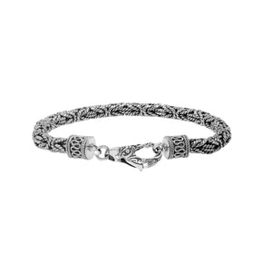 Wholesale sterling silver bracelet showcasing a detailed 4MM woven Balinese chain with oxidized texture and a secure lobster lock suitable for catalog listings.