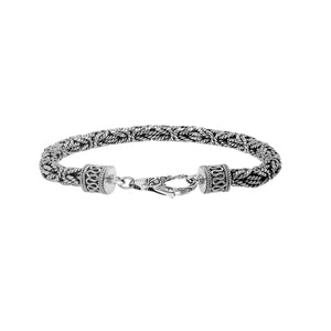 Wholesale sterling silver bracelet featuring a handcrafted 5MM woven Balinese chain design with oxidized detailing and a secure lobster lock for catalog listings.