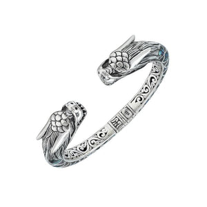 Wholesale sterling silver phoenix cuff bangle featuring Abalone Shell accents, intricate Balinese scroll engraving, and a secure hinge lock for detailed artisan presentation.