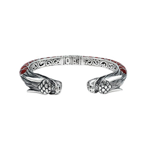 Wholesale sterling silver phoenix-inspired bangle featuring Red Coral accents, ornate Balinese scroll engraving, and a sturdy hinge lock for detailed, artisan-quality wholesale jewelry collections.