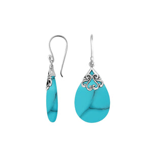 Sterling silver turquoise shell teardrop earrings with scroll accent design for wholesale jewelry buyers