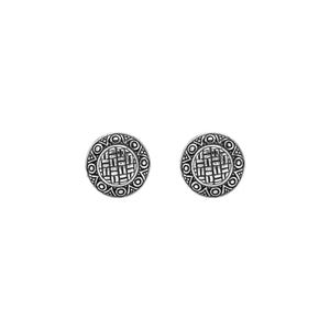 Wholesale sterling silver round patterned earrings with textured metal detailing and omega clip closure.