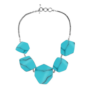 Sterling silver necklace with hexagon turquoise shell links, polished artisan finish.