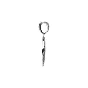 Sterling silver diamond-shaped pendant featuring circular dot engravings, geometric Balinese detailing, and polished oxidized finish.