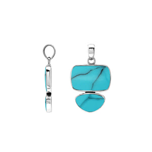 Sterling silver pendant featuring double Turquoise Shell stones with a polished surface and detailed Balinese craftsmanship.