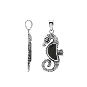 Sterling silver seahorse pendant with Black Shell inlay and detailed Balinese design featuring a smooth polished finish.