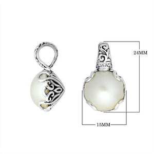 Sterling silver Mabe Pearl pendant with Balinese filigree and polished finish.