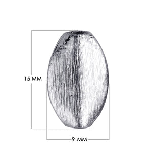 Silver overlay over copper handcrafted oval barrel bead from India with brushed antique finish