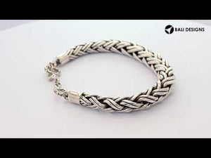 Wholesale sterling silver bracelet featuring a thick 8MM round braided chain with polished and oxidized detailing, complete with a secure toggle lock for bulk catalog display.