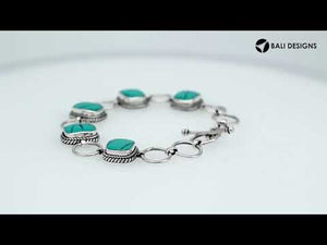 Sterling Silver Bracelet With Cushion Turquoise Shell Accents In Rope Bezels And Large Silver Rings