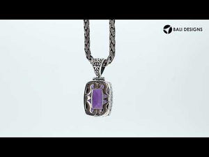 Sterling silver rectangular pendant with faceted amethyst quartz and ornate Bali detailing, handcrafted in Indonesia