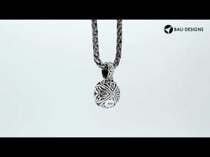 Sterling silver Mabe Pearl pendant with Balinese filigree and polished finish.