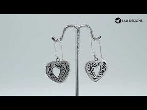 Sterling Silver Carved Heart-Shaped Dangle Earrings Featuring Dotted Balinese Detailing And Oxidized Finish