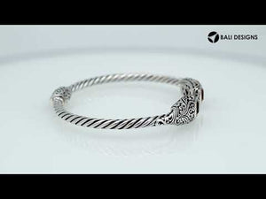 Elegant sterling silver open bangle with citrine quartz accents and Balinese engraved pattern