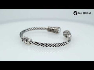 Sterling silver twisted bangle with pearl ends and Balinese carvings, handcrafted in Bali
