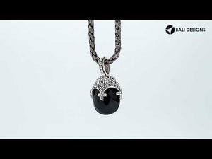 Sterling silver black onyx heart pendant with ornate Balinese handcrafted pattern