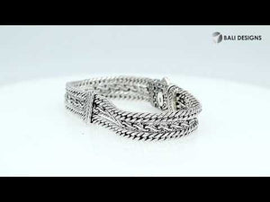 A wholesale sterling silver woven chain bracelet featuring intricate Balinese detailing, oxidized textures, multiple braided strands, and a secure push clasp suitable for bulk jewelry orders.
