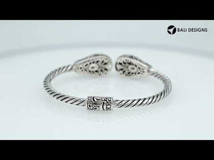 Sterling silver handcrafted bangle with ruby, twisted rope design, Balinese jewelry.