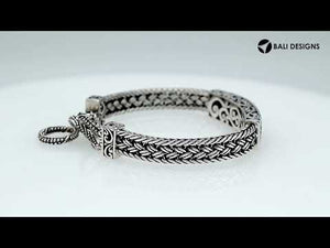 Sterling silver bracelet with Coral inlay and toggle lock handcrafted in Bali.