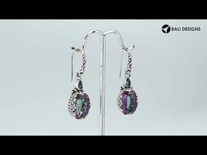 Wholesale sterling silver earrings featuring a dual-stone design with vibrant Amethyst Quartz and bright Blue Topaz Quartz, framed in ornate carved detailing with earwire lock for premium catalog-ready presentation.