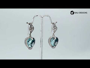 Sterling silver Blue Topaz Quartz heart floral drop earrings with oxidized finish and earwire lock.