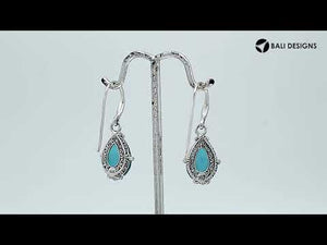 Wholesale Sterling Silver London Blue Topaz Quartz Teardrop Earrings With Detailed Balinese-Style Metalwork.