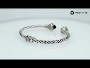 Wholesale sterling silver twisted cable cuff bracelet featuring faceted amethyst quartz end caps, 4MM band size, hinge lock, and detailed Bali-style engravings.