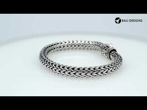 Sterling Silver woven bracelet featuring a patterned push lock and a polished high-gloss finish, crafted for durability and refined wholesale presentation.
