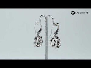 Sterling Silver London Blue Topaz Quartz earrings with textured silver frame and Earwire closure.