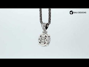 Sterling Silver Pendant With Round Mabe Pearl And Balinese Ornamental Design.