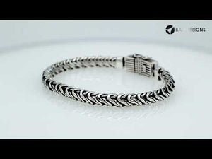 Wholesale sterling silver oxidized Bali weave bracelet with ribbed clasp handcrafted in Bali, Indonesia.