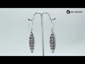 Wholesale Sterling Silver hammered marquise drop earrings with beaded edge detailing.