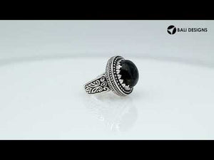 Sterling silver handcrafted Bali ring with faceted Black Onyx and beaded halo design.