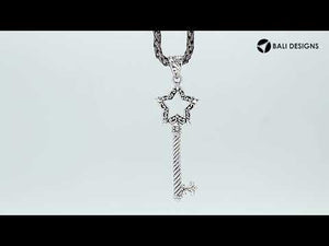 Sterling silver star-shaped key pendant with decorative filigree detailing, twisted stem design, and polished finish suitable for wholesale jewelry collections
