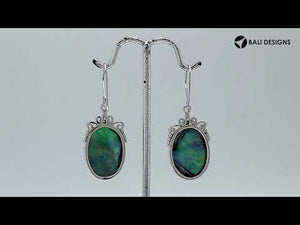 Sterling silver abalone oval earrings with scroll and bead accent design for wholesale jewelry buyers